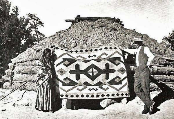J B Moore with Navajo weaver and rug